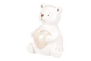 Medvídek keramický, držící srdce.